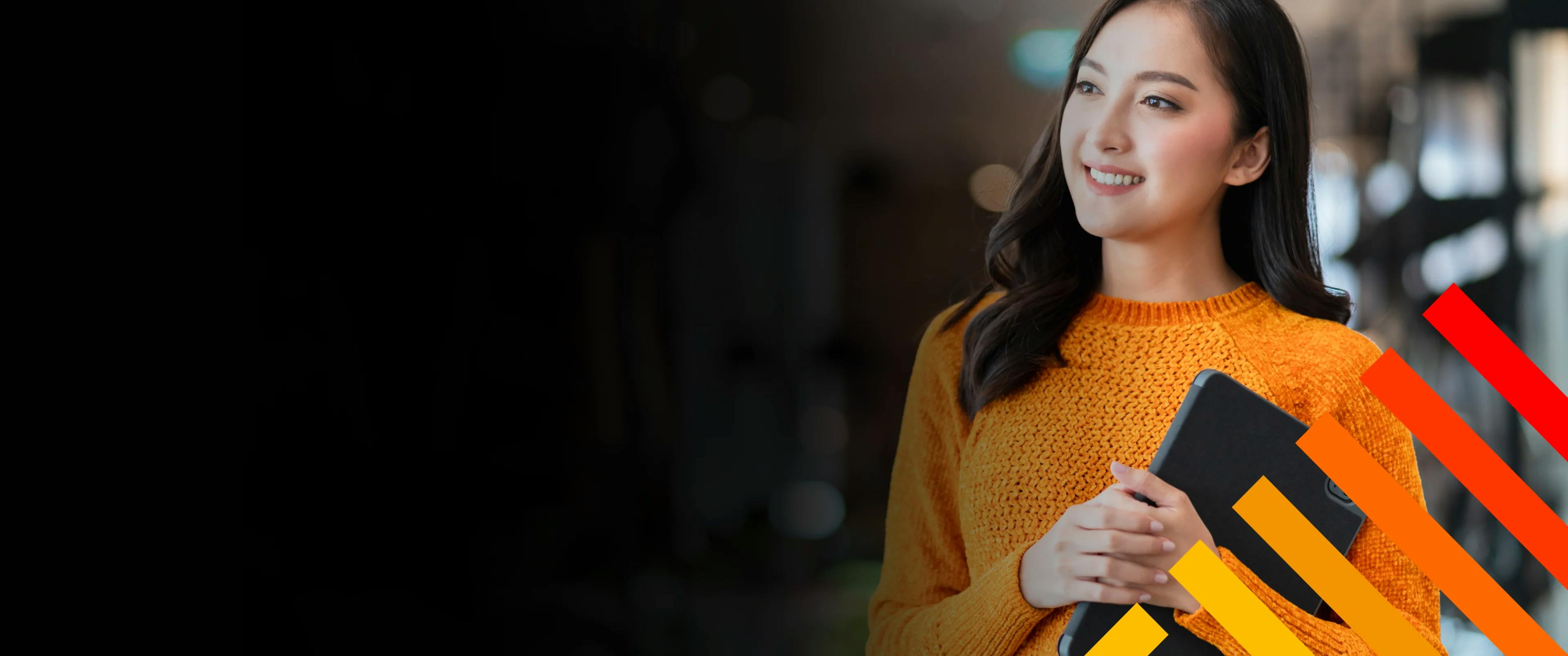 Business woman carrying tablet computer